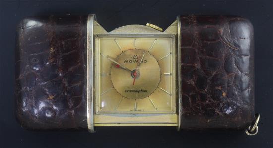 A gilt and leather outer cased Movado Ermetophon travelling watch,